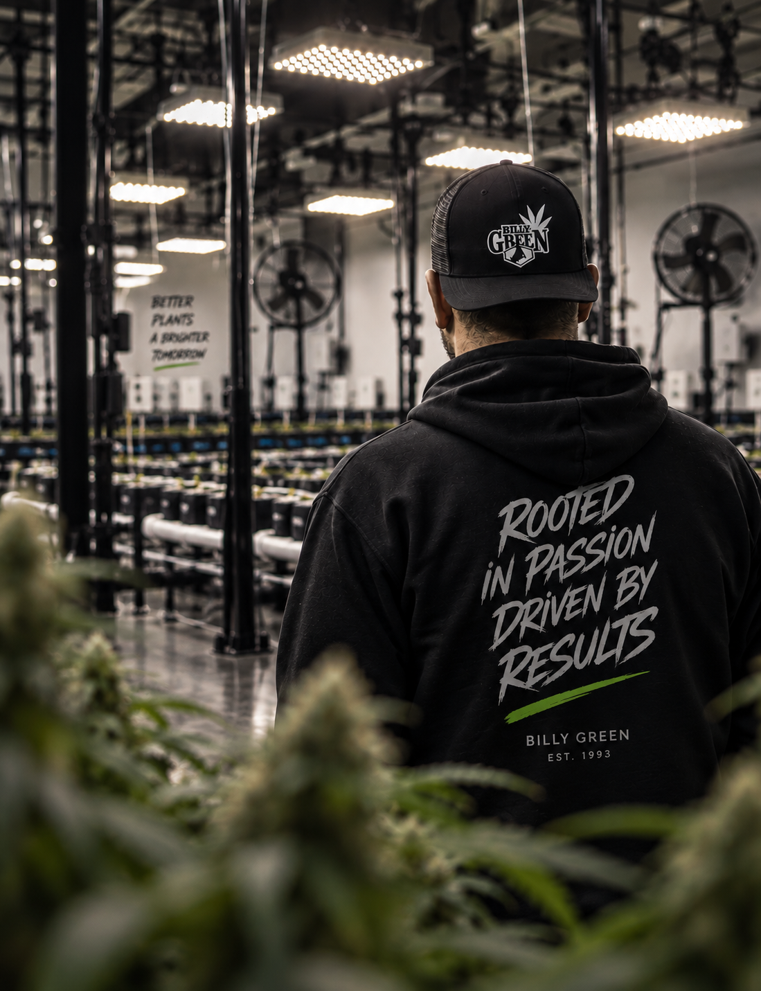 Billy Green standing in a cultivation room wearing Billy Green apparel
